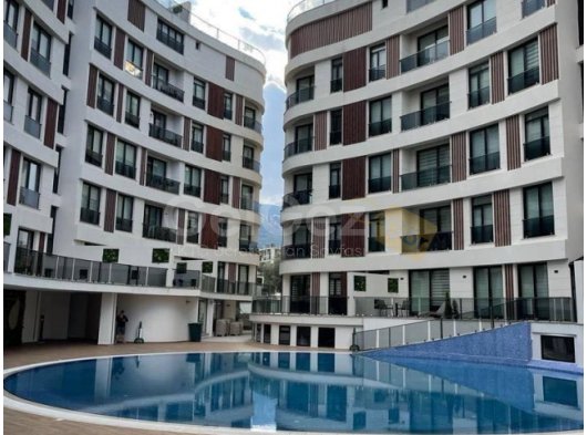 Girne merkez Aurasiya sitesinde kiralik 2+1 daire