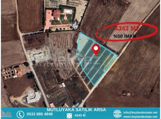 MAĞUSA MUTLUYAKA BÖLGESİ SATILIK 4343m2 İMARA ACIK ARAZİ