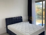 GİRNE ALSANCAKTA NEJAT BRİTİSH KOLEJE YAKIN DENİZ MANZARALI MUHTEŞEM SİTE'DE HAVUZLU 2+1 SATILIK
