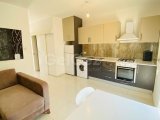 Girne ' de Harika Yatırım Fırsatı Girne Amerikan Üniversitesi yanında hazır kiracılı 1+1 Full eşyalı daire