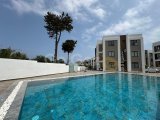 Girne Lapta'da Havuzlu Sitede Sıfır Satılık Taksitli 1+1 Teraslı Daire (LÜTFEN AÇIKLAMAYI OKUYUNUZ ! )
