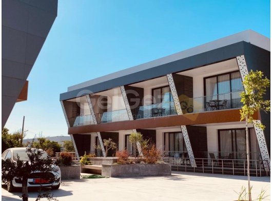 GİRNE OZANKÖY'DE FİNAL ÜNİVERSİTESİNE YÜRÜME MESAFESİNDE KİRALIK ORTAK HAVUZLU SİTEDE 1+1