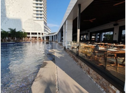 Grand Sapphire hotel 2+1 with poll and GENERATOR. All tax paid. Full furniture.