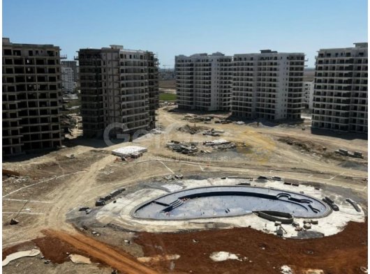 CAESAR RESORT 6.ETAP 1+1 VERGİ ÖDENDİ 9.KAT FULL ÖNÜ AÇIK HAVUZ MANZARALI