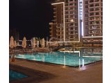 İskele Long Beach River Side Sitesinde Yüksek Kira Getirisine Sahip Yatırımlık 2+1 Eşyalı Satılık Daire