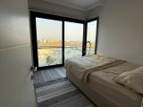 İskele Long Beach River Side Sitesinde Yüksek Kira Getirisine Sahip Yatırımlık 2+1 Eşyalı Satılık Daire