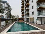 İskele Long Beach Bölgesi Homeland Sitesi'nde Havuzlu Full Eşyalı Lüks 2 +1 Satılık Daire