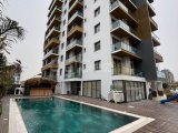 İskele Long Beach Bölgesi Homeland Sitesi'nde Havuzlu Full Eşyalı Lüks 2 +1 Satılık Daire