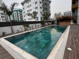 İskele Long Beach Bölgesi Homeland Sitesi'nde Havuzlu Full Eşyalı Lüks 2 +1 Satılık Daire