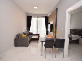 Girne Alsancak'ta Şokmar ve Merit Otele Yakın Eşyalı Yeni Binada Kiralık 1+1 Daire