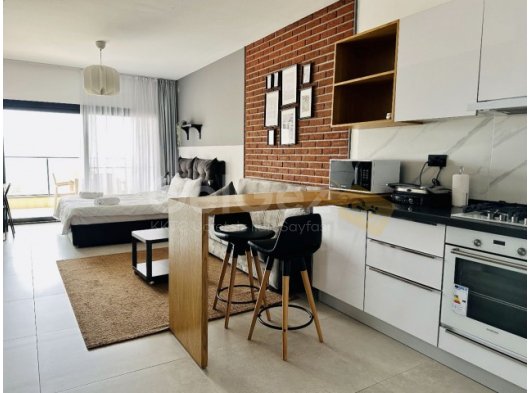 İskele, Boğaz - Caesar Blue' da Full Eşyalı Deniz Manzaralı Stüdyo Daire! (Acente Ücreti ve Aidat Yok)