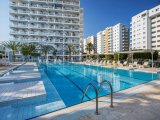 İskele, Long Beach - Caesar Resort & SPA'da Havuz Manzaralı 1+1 Full Eşyalı Daire