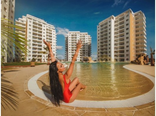 İskele, Long Beach - Caesar Resort & SPA'da Havuz Manzaralı 1+1 Full Eşyalı Daire