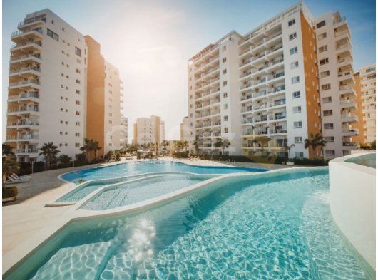 İskele, Long Beach - Caesar Resort & SPA'da Havuz Manzaralı 1+1 Full Eşyalı Daire