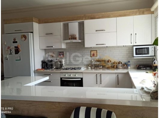 Gazimağusa Yeniboğaziçi'nde güneş paneli mevcut 3+1 ful eşyalı satılık daire