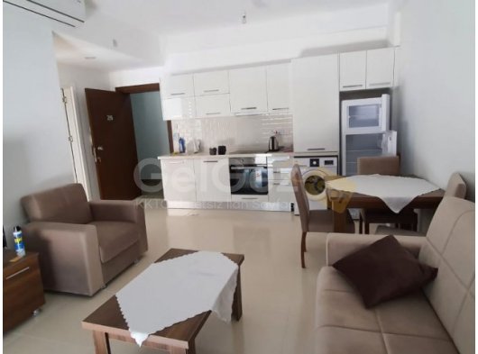 Gazi Magusa caddemde otel yönüne bakan bölümde satılık 1+1 daire