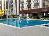 İskele Long Beach'te deniz manzaralı, eşyalı 2+1 satılık daire.