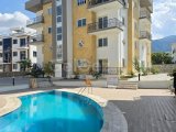 Girne Alsancak'ta Merit Otellere Yakın Havuzlu Site İçinde Takasa Uygun 1+1 Satılık Daire