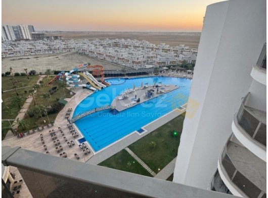 1+1 eşyasız ,long beach’te,edelweise????aidat dahil????