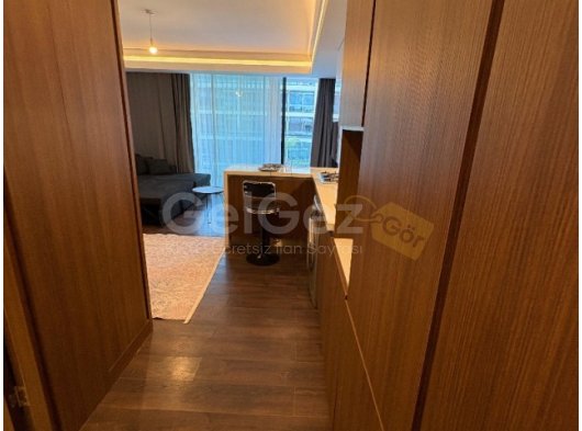 İskele’de Satılık 1+0 Daire – Grand Sapphire’de Havuz Manzaralı Stüdyo!