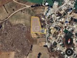 Gazimağusa İncirli de içerisinde inşaat halinde ev bulunan 7 dönüm satılık arazi