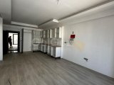 GAZİMAĞUSA ÇANAKKALE BÖLGESİNDE SATILIK FIRSAT HAVUZLU YENİ 1+1 DAİRE