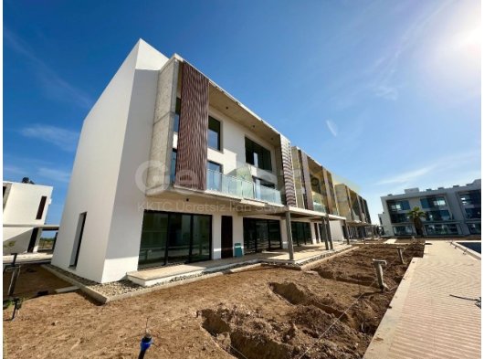 Döveç: La İsla Villas sitesinde satılık 3+1 havuz çıkışlı daire. KDV, Trafo giderleri dahil fiyat!