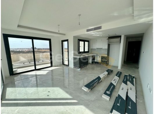 Iskele Long Beach'te Satılık Deniz manzaralı 1+1 daire. KDV, Trafo fiyata dahil