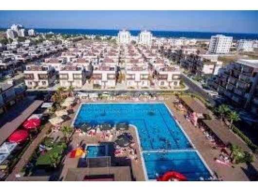 krediye uygun Yatirim firsat acil satış kelepir fiyat İskele, Long Beach, royalsun projesinde /tüm masraflar ödenmiş /5dakıka denize doğru yürüyüş / 2+1 daire