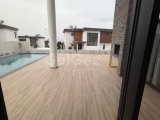 Girne Zeytinlikte kiralık eşyalı 4+1 sıfır villa