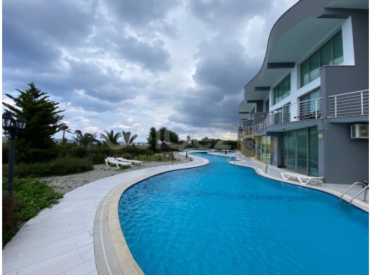 Lapta denize sıfır site içerisinde satılık 2+1 loft daire