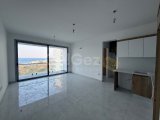 Girne yeni limanda denize sıfır full deniz manzaralı satılık 2+1 daire