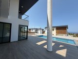 Girne Zeytinlikte deniz manzaralı satılık 4+1 villa