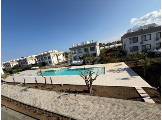 Alsancakta Camelot plajına yürüme mesafesinde satılık sıfır 2+1 daireler