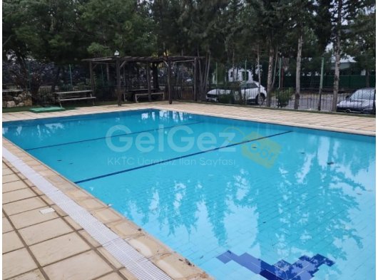 Alsancak havuzlu sitede zemin kat satılık 3+1 daire