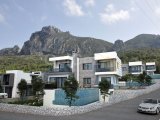 Girne Karmi Bölgesinde Doğa İle İç İçe Dağ ve Deniz Manzarasına Sahip Lüks Villalar Satılık
