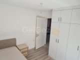 GİRNE MERKEZ'DE UYGUN FİYATA ASANSÖRLÜ YENİ BİNA'DA EŞYALI 2+1 SATILIK DAİRE