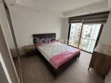 Girne Merkez'de Otoparklı Asansörlü Bina'da Deniz Manzaralı Eşyalı Kiralık 2+1 Daireler