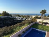 Girne Çatalköy'de Deniz Manzaralı Özel Havuzlu Bahçeli Kiralık 3+1 Villa