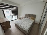 Girne Merkez'de Otoparklı Asansörlü Bina'da Deniz Manzaralı Eşyalı Kiralık 2+1 Daireler