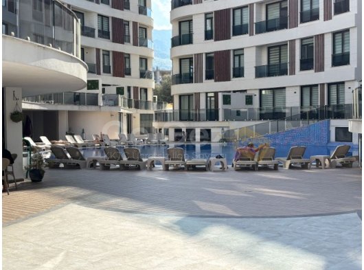 Girne Merkez'de Kapalı Otoparkı ve Gym Bulunan Sitede İçi Özel Yapılı Kiralık 3+1