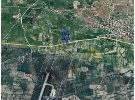 MAĞUSA GEÇİTKALE HAVAALANI KARŞISINDA 55 DÖNÜM ANAYOLA SIFIR