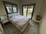 Girne Alsancak'ta Havuzlu Sitede Satılık Eşyalı 2+1 Daire