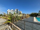 Girne Alsancak'ta Havuzlu Sitede Satılık Eşyalı 2+1 Daire