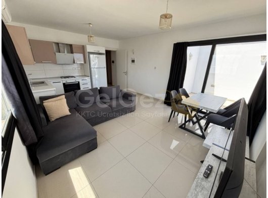 Girne Merkez'de Yüksek Kira Getirili Deniz Manzaralı Eşyalı Satılık 2+1 Daire