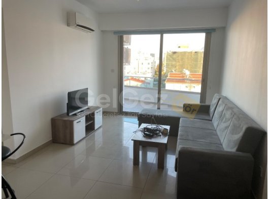 GİRNE MERKEZ NUSMAR MARKET BÖLGESİ ASANSÖR-GÜVENLİK KAMERASI - KAPALI OTOPARKI BULUNAN BİNADA KİRALIK 1+1 FULL EŞYALI RESIDENCE DAİRE