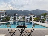 GİRNE KARAOĞLANOĞLUNDA HAVUZLU BAKIMLI SİTEDE FULL EŞYALI KİRALIK 1+1 DAİRE