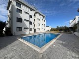Girne Alsancak'ta Anayola Yakın Havuzlu Sitede Satılık Modern 2+1 Daire