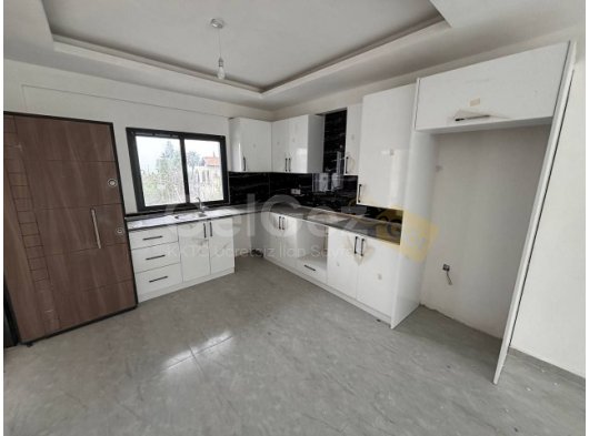 Girne Lapta'da Güzel Konum'da Sıfır Satılık 2+1 Daireler