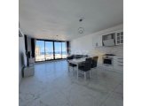 GİRNE MERKEZ FULL EŞYALI GENİŞ KULLANIM ALANINA SAHİP FULL DENİZ MANZARALI MUHTEŞEM KİRALIK 2+1 DAİRE